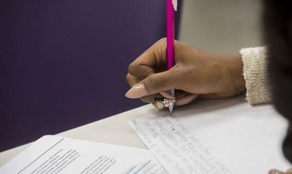 Student writing.