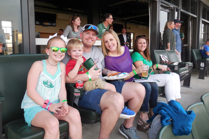 A family attending CAS Alumni Night.