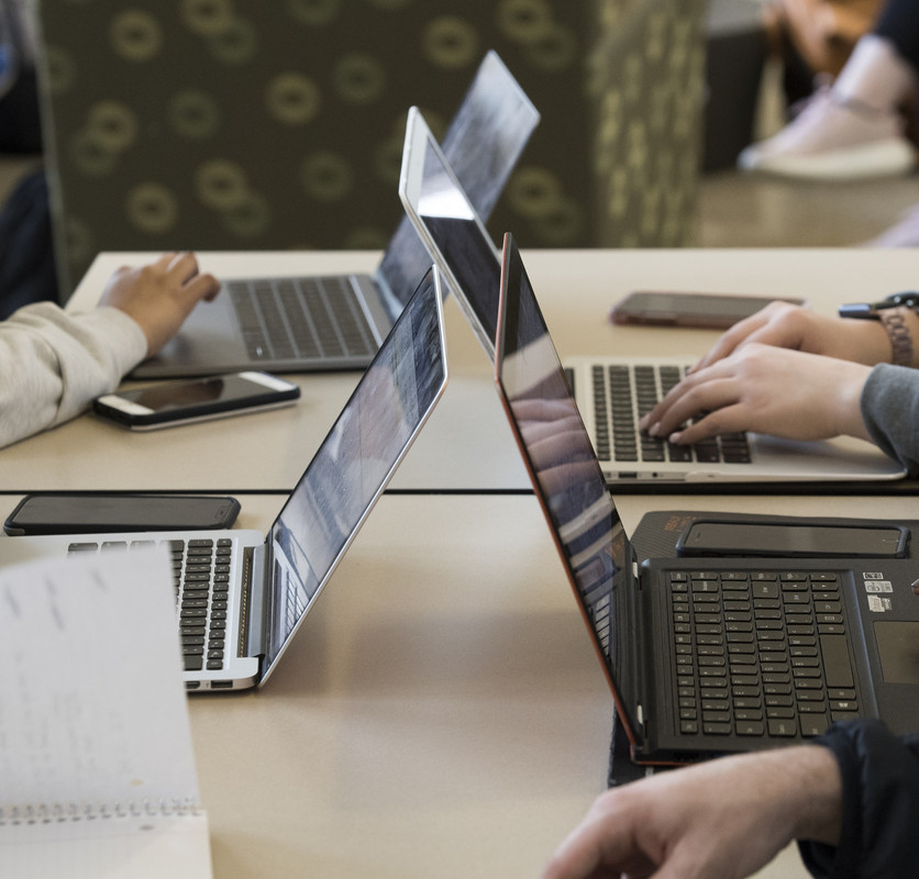 Photo of students using laptops