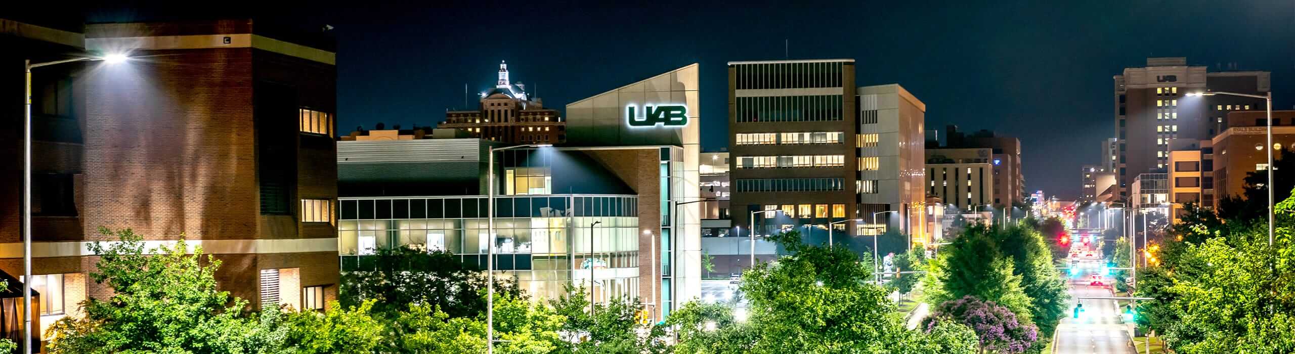 Shot of UAB campus buildings at night. 