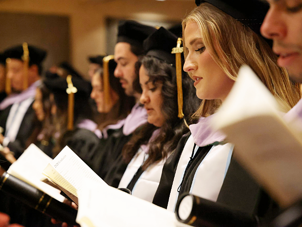 Graduates reading Dentists Pledge at 2026 Commencement Ceremony