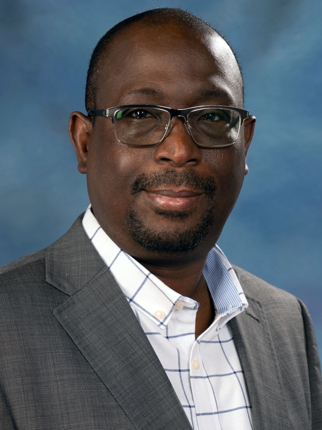 Adeyi_Headshot_2025.jpg