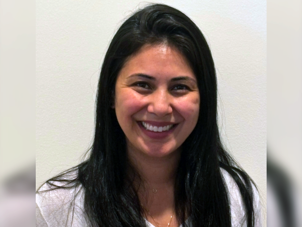 Woman with dark hair on white background
