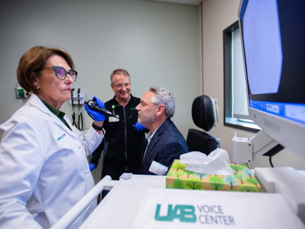Dr. Hapner and Dr. Simpson treat a patient at UAB Voice Center