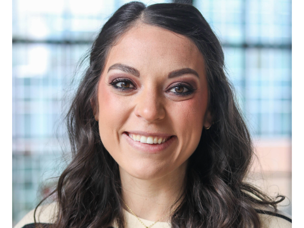 Headshot of Jenn Handrop in the Volker Hall Atrium.