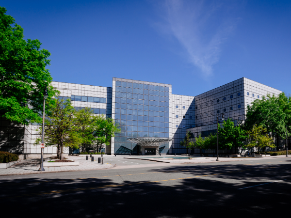 Outside view of kirklin clinic, white building with windows on a sunny day