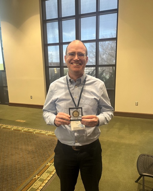 Dr. Knight with his Commemorative Patent Coin