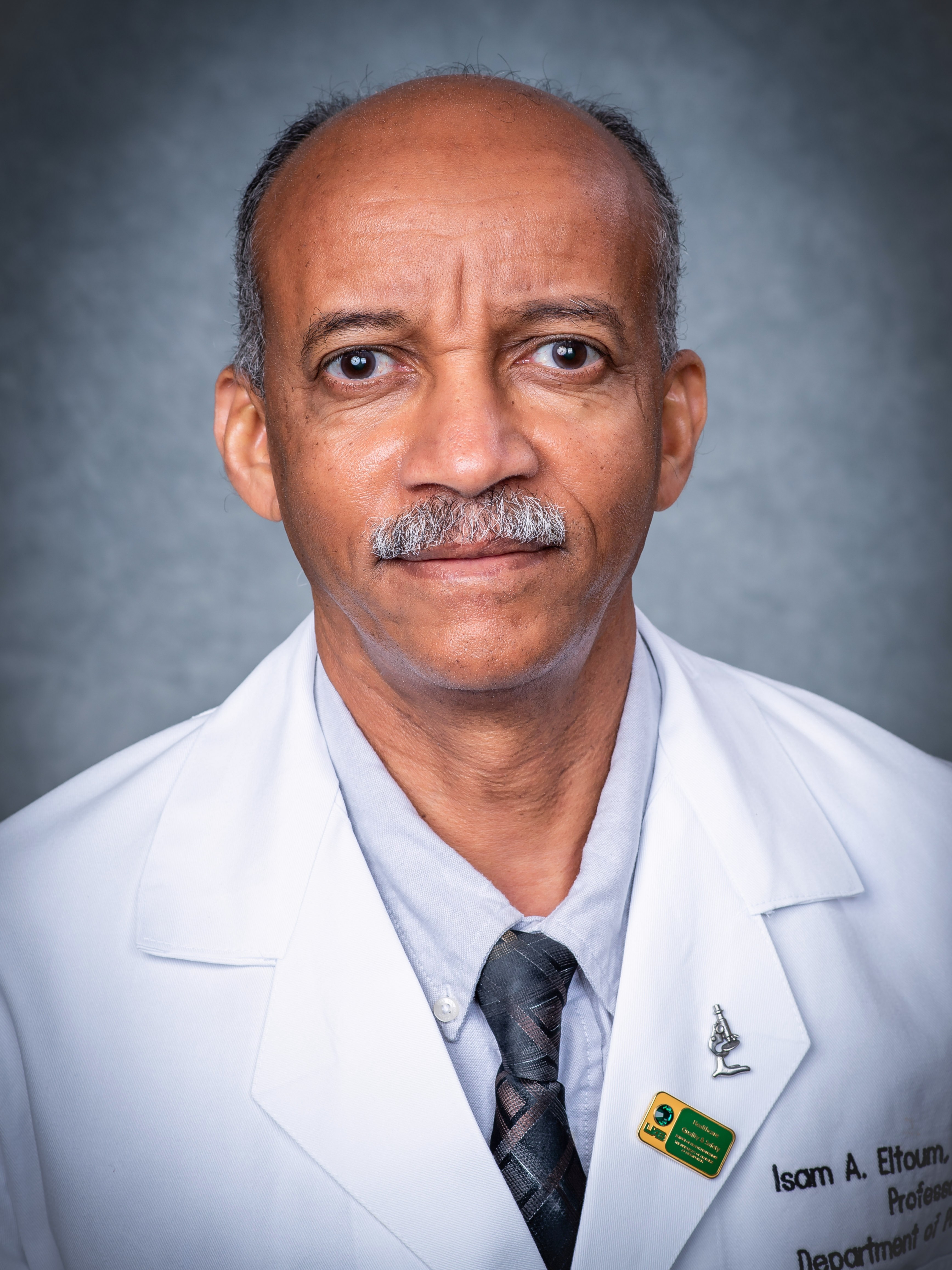 Eltoum, Isam-Eldin, M.D., M.B.A.