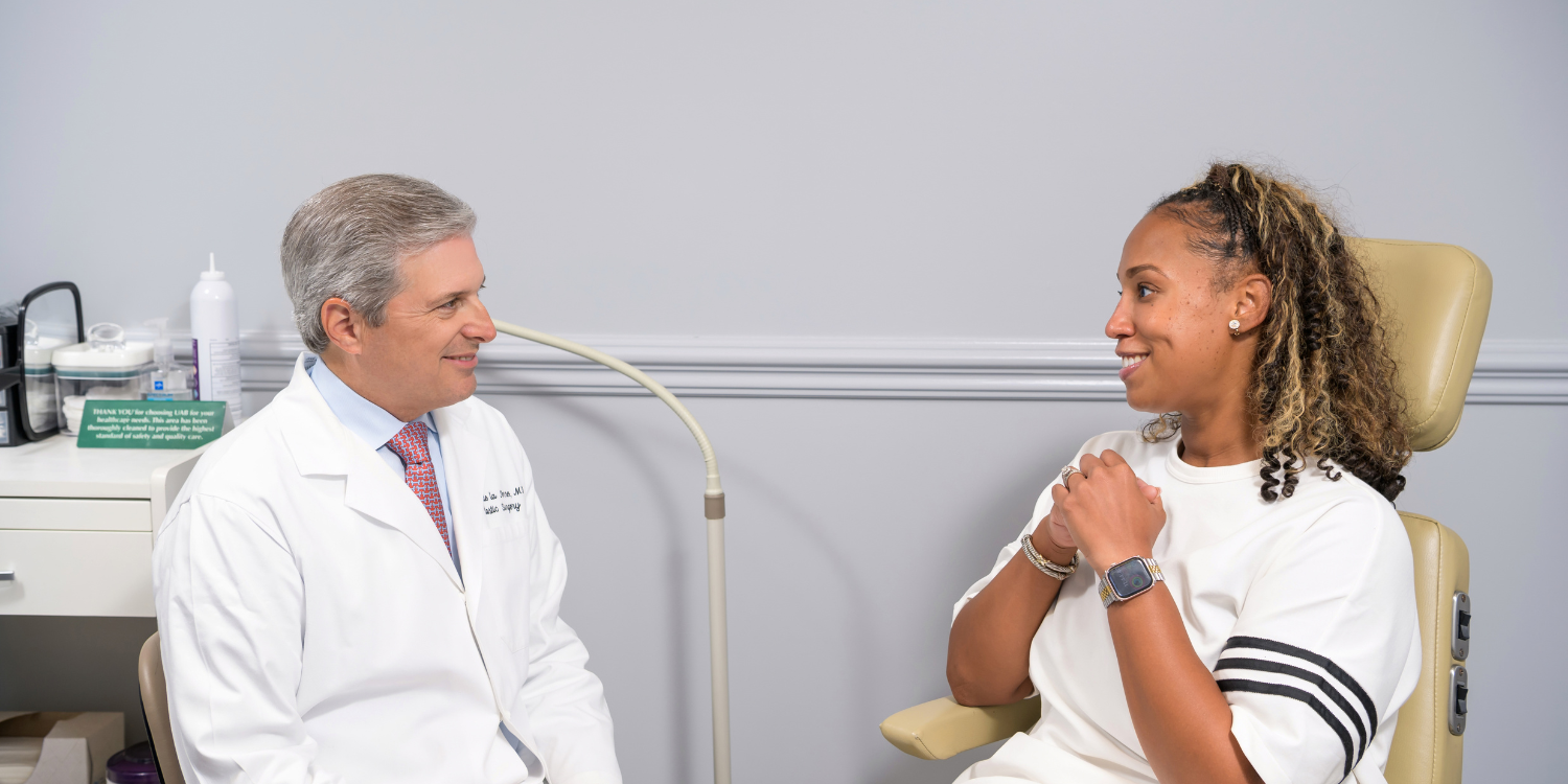 Professor in the Division of Plastic Surgery Dr. R. Jobe Fix talks with a patient at The Kirklin Clinic. Professor and Division Director Dr. Jorge de la Torre talks with a patient at The Kirklin Clinic.
