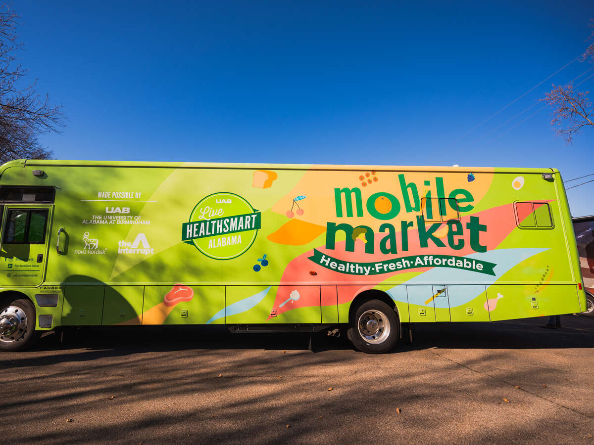From side, parked Live HealthSmart Alabama Mobile Market