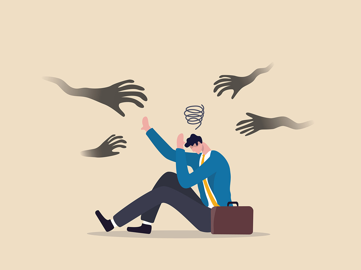 Hands approaching an afraid man from all sides