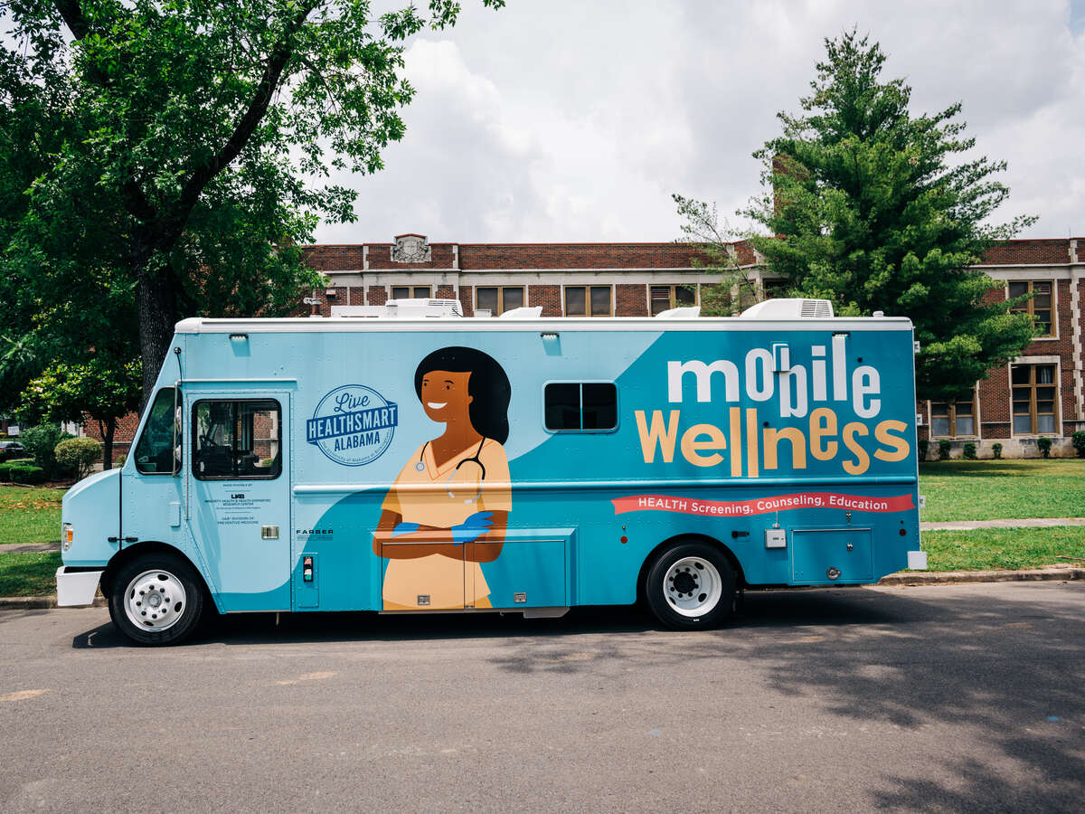From side, parked Live HealthSmart Alabama Mobile Wellness