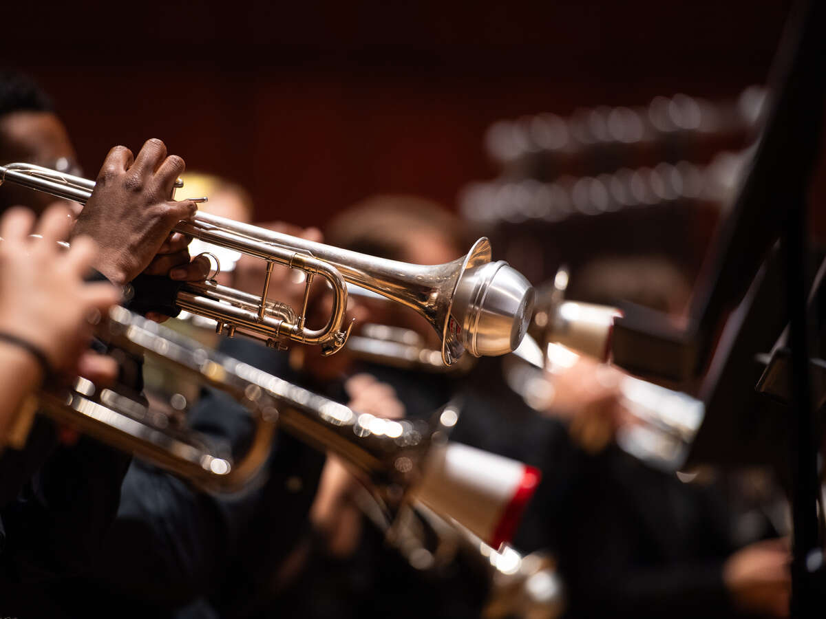 Students hold their instruments during rehearsals.