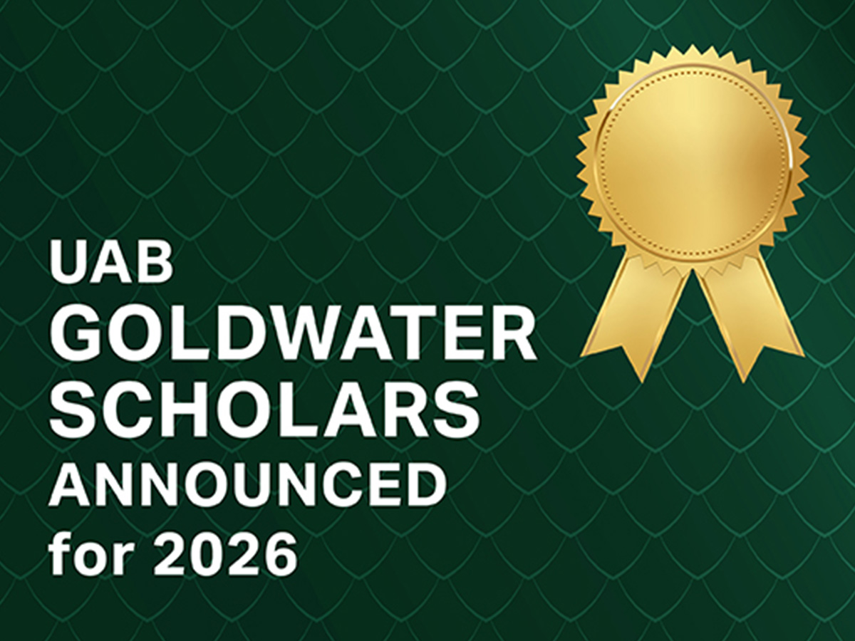 UAB graphic with green dragon scale background and white text displaying "UAB Goldwater Scholars announced for 2026." with a gold badge ribbon beside the text. 