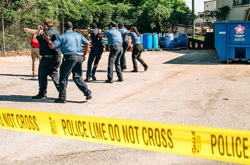 Members of UAB Police and Public Safety perform drill maneuvers in a training exercise