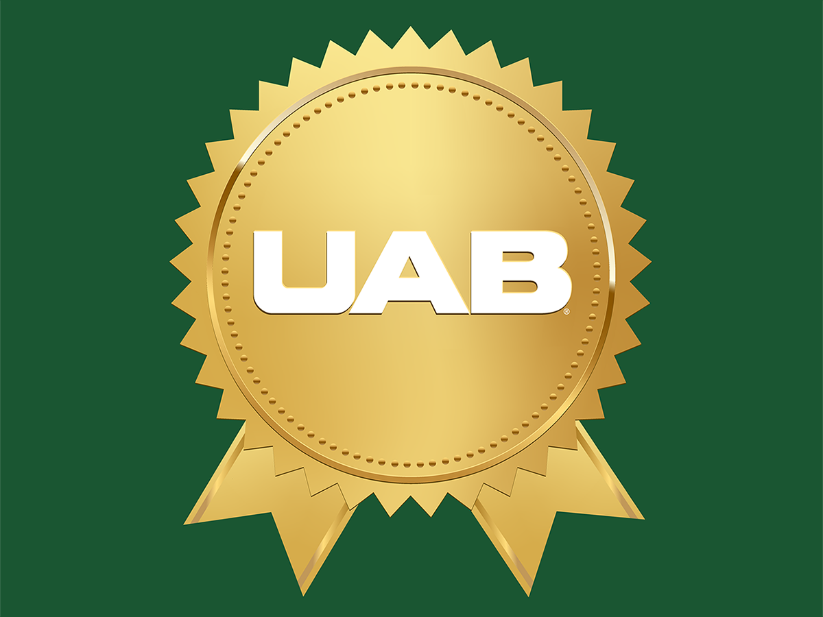  A gold seal on a green background has letters that read U A B