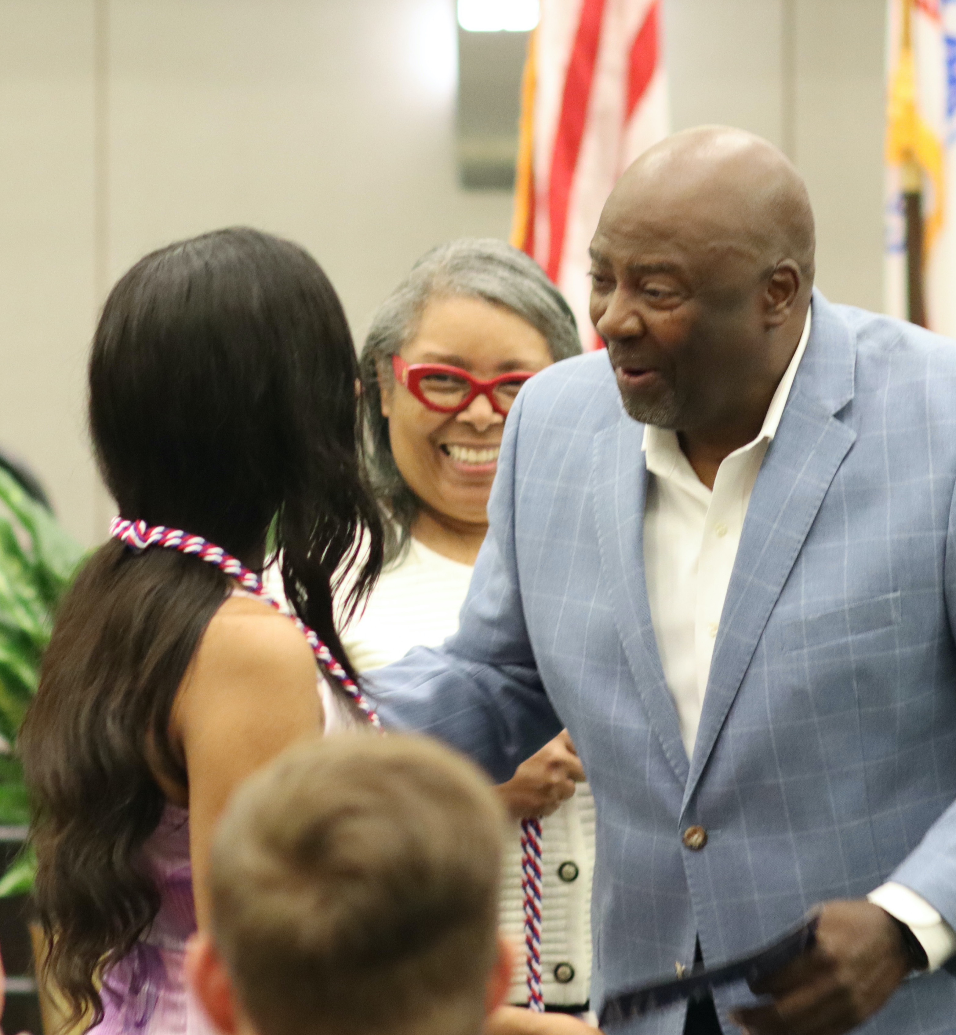 UAB Veteran Services Director Walter Stewart Honoring a Graduating Student Veteran at Coins and Cords Ceremony