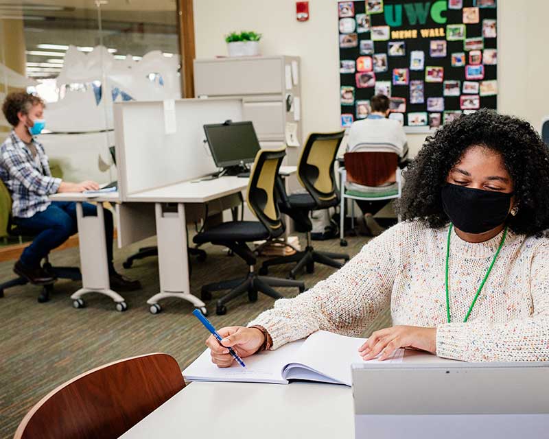 Writing Center tutors working in the UAB Writing Center office